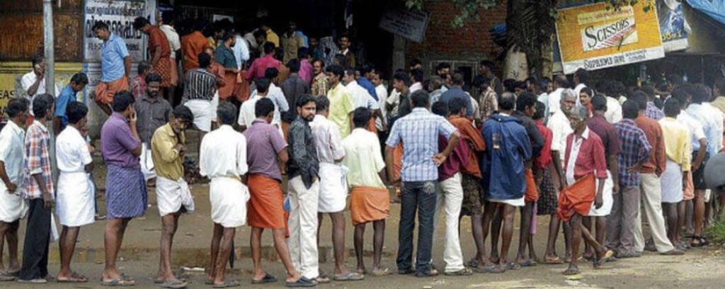 Culture shock in Germany 2: People standing in a que to buy liquor in India